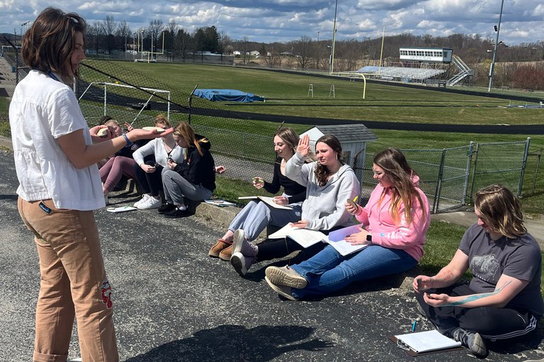 Celia teaching students