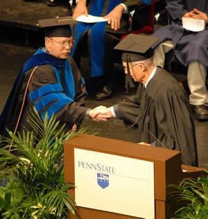 Dennis Scanlon and George Kemp, President of the Alumni Society