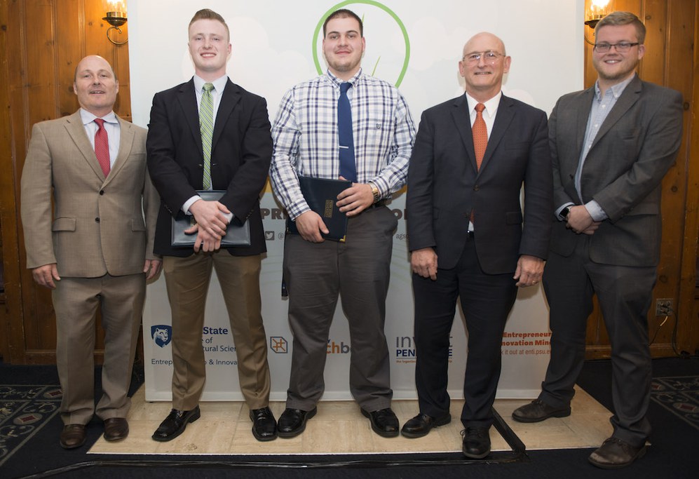 won $2,500 and second place Thursday April 13 in the Ag Springboard student business pitch contest. L to R: Mark Gagnon, Entrepreneurship Coordinator, College of Agricultural Sciences, CAS students Sam Collins (agribusiness management major), Curtis Hershey (animal science major), CAS Dean Richard Roush, and Luke Yost (material science major). (Photo by Cameron Hart)