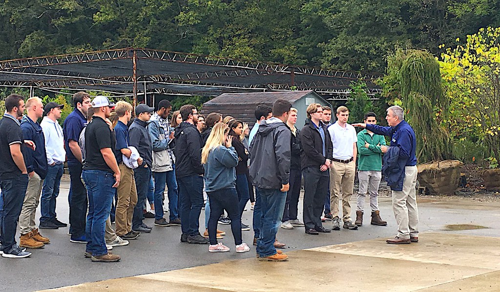 About 70 agribusiness management students toured the landscape services firm's operation and HQ in Pittsburgh during a visit in Sept. 2018. As an experiential learning case study, the students are helping Eichenlaub study whether customers will accept autonomous lawn mowers.