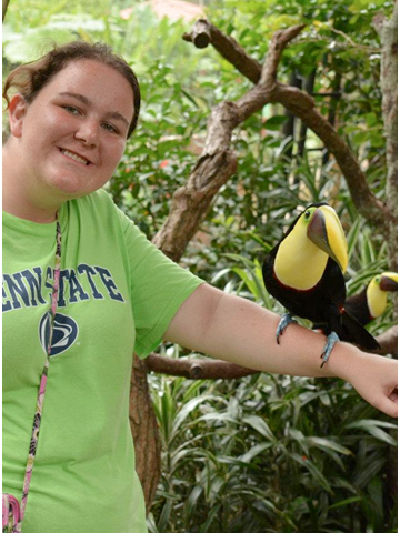 Samantha holding a native species of bird, the toucan
