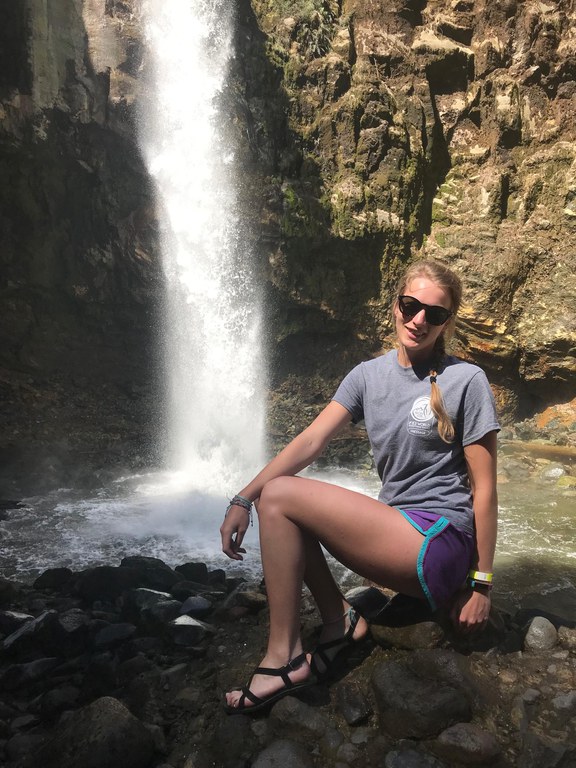 Visiting a waterfall on our hike