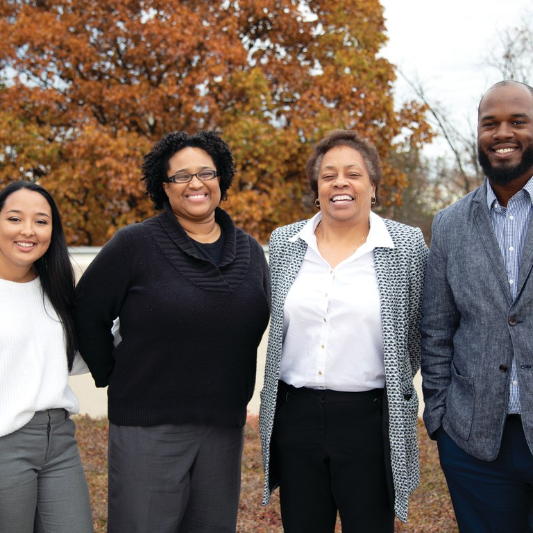 Alumni who engaged with faculty, students, and staff during a November visit were, from left, Manoelle DaSilva, Shakira Nelson, Tina Terrell, and Ian Stringer.