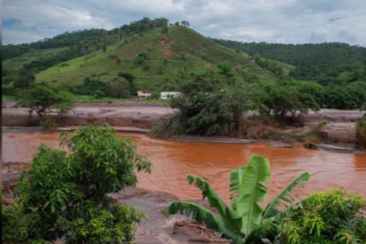 The Mariana Dam disaster in 2015 released more than 11 billion gallons of iron ore waste. The huge wave of toxic mud flowed into the Doce River (shown here) basin surrounding Mariana City in Minas Gerais, a state in southeast Brazil. Photo: Erika Ganda