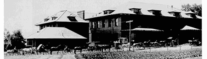 Farmers line up to deliver milk to the College creamery (later Patterson Building). The creamery sold most of its products in the State College and Altoona retail markets.